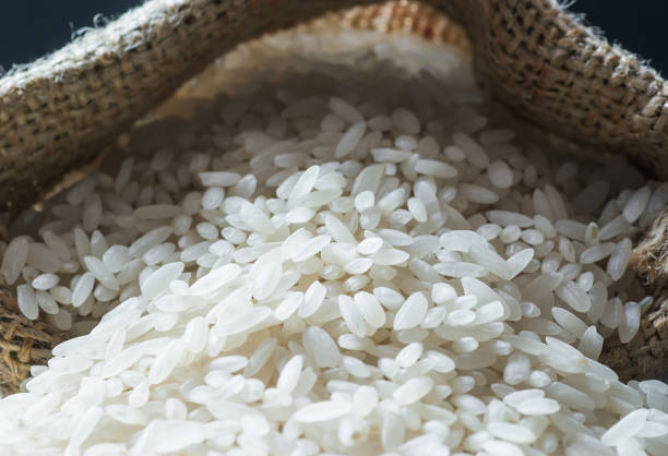 istock turkish raw white rice grains in burlap sack 1141089248
