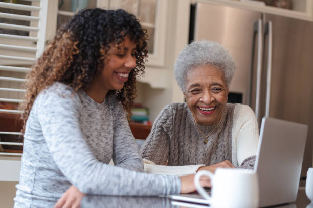 istock Senior woman learning how to use a laptop 1141094505