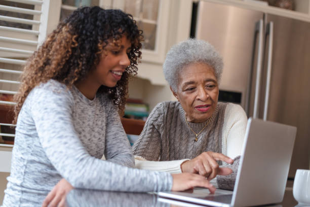 istock Senior woman learning how to use a laptop 1141094507