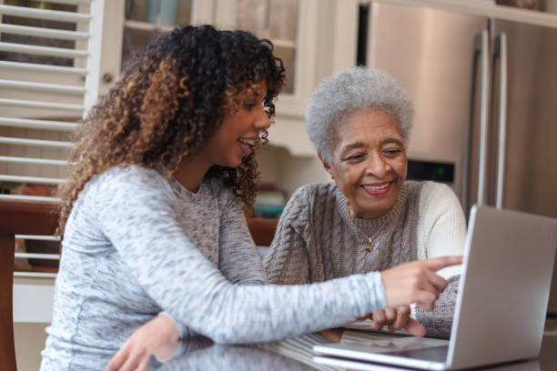 istock Senior woman learning how to use a laptop 1141094508