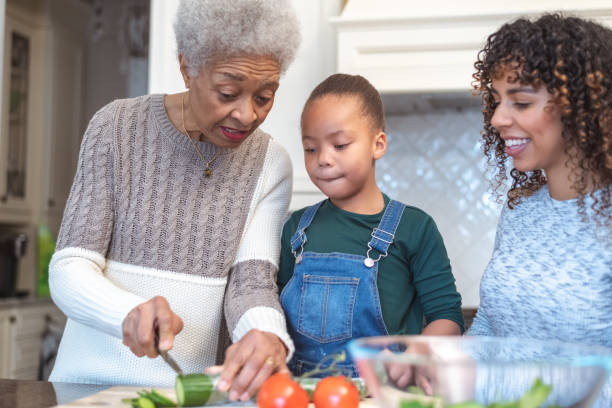 istock Family generations cooking together 1141094520