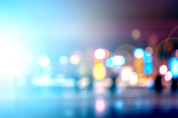istock Abstract colorful circular bokeh with city background 1141094655