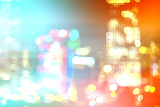 istock Abstract colorful circular bokeh with city background 1141094660