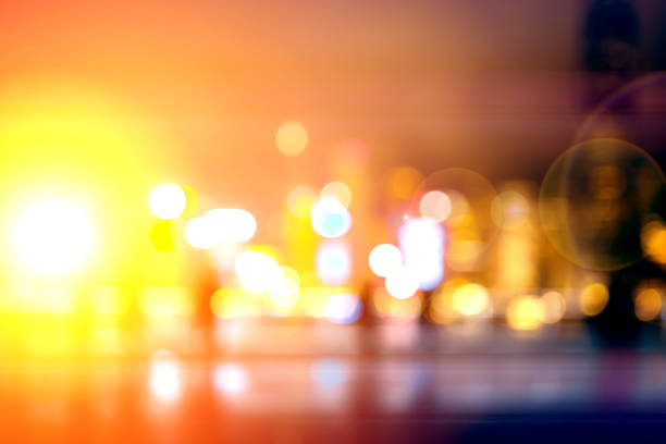 istock Abstract colorful circular bokeh with city background 1141094661