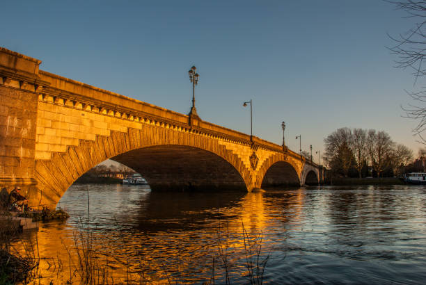 Kew Bridge in west London Kew Bridge in west London, listed bridge over the river Thames chiswick stock pictures, royalty-free photos & images