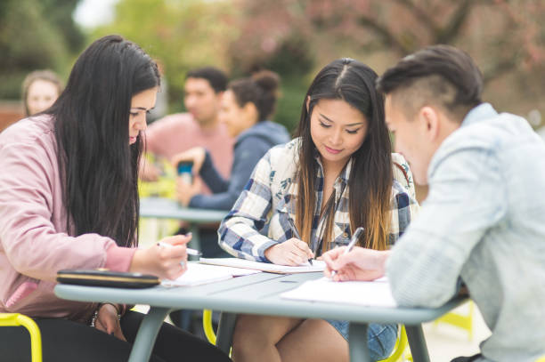 istock College students studying at an outdoor table 1141096047