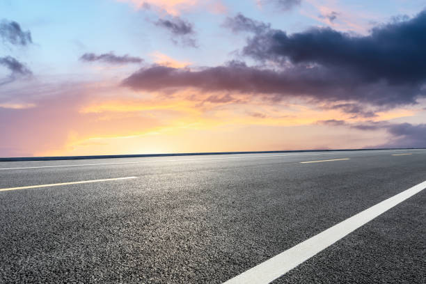 istock Asphalt road ground and beautiful sky clouds at sunset 1141099838