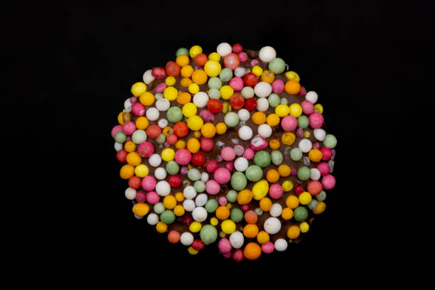 веснушка на черном - flavored ice lollipop candy affectionate стоковые фото и изображения