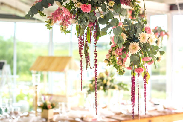 istock Mixed flower arrangements, bouquets, circles and table flowers at a wedding/event. 1141106434