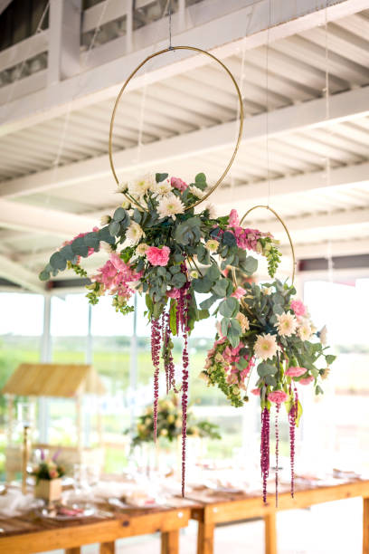 istock Mixed flower arrangements, bouquets, circles and table flowers at a wedding/event. 1141106461
