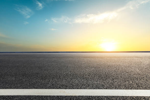 istock Asphalt road ground and beautiful sky clouds at sunset 1141109064