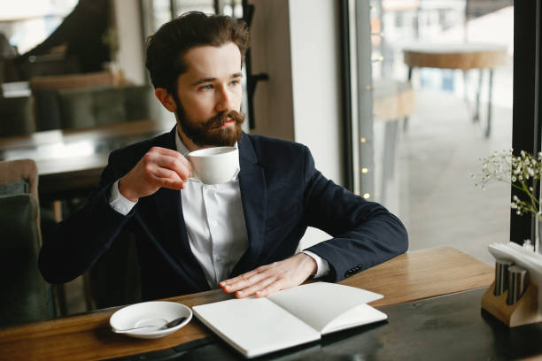 istock Stylish businessman working in a office 1141112156