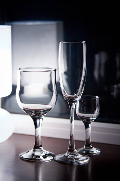 istock Empty clean wine glasses in dim light close-up. 1141119403