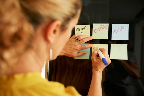 istock Woman writing shopping list 1141120511