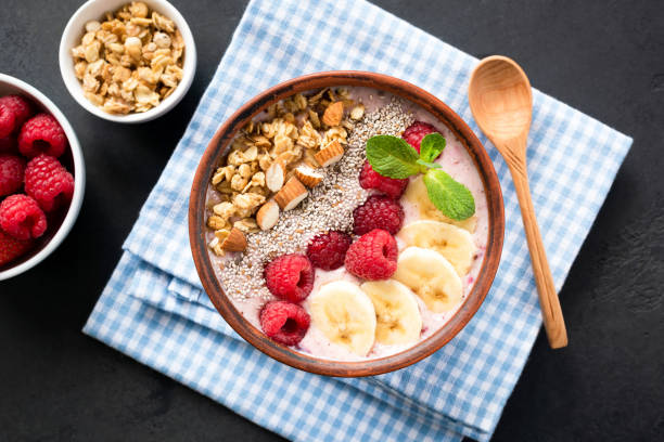 istock Tasty Smoothie Bowl With Berries, Granola, Chia Seeds 1141120597