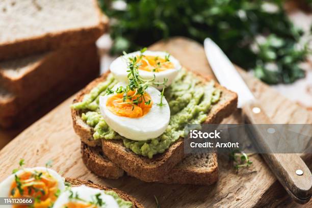 Healhy Breakfast Toast With Avocado Egg Stock Photo - Download Image Now - Breakfast, Egg, Avocado