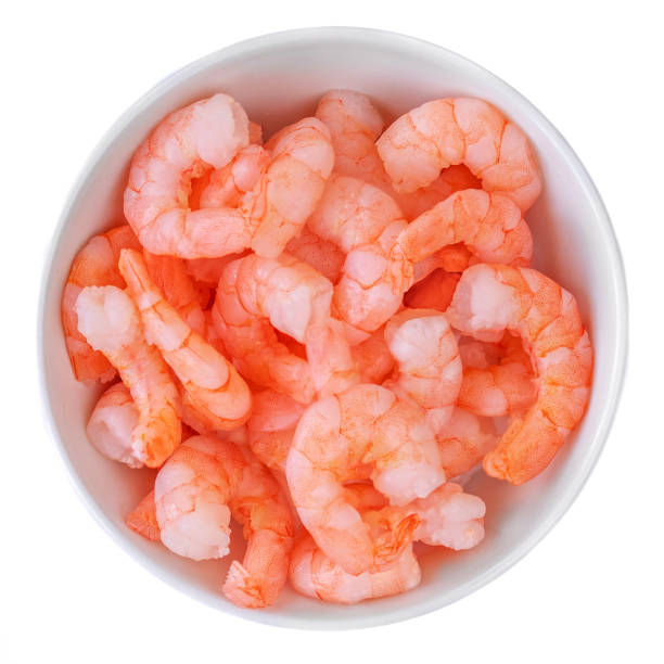 istock Steamed tiger shrimp in a bowl  isolated on white background. Top view 1141124535