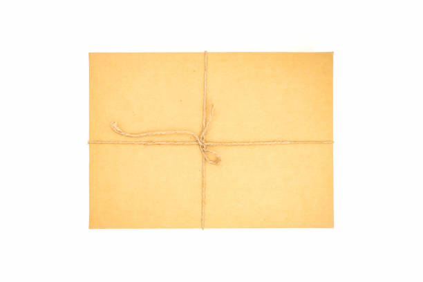 brown paper box, tied with string. - string package brown paper imagens e fotografias de stock