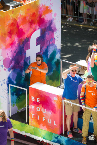 facebook corporation in seattle's gay pride parade - homosexual gay pride business rainbow imagens e fotografias de stock