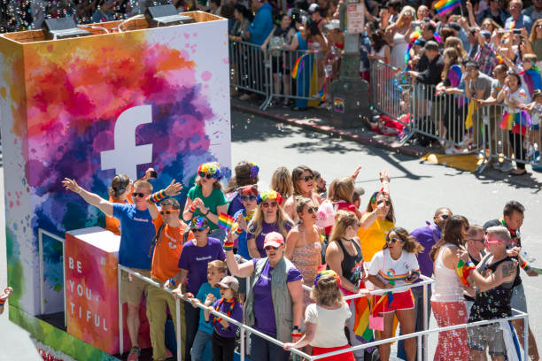 facebook corporation en el gay pride parade de seattle - homosexual gay pride business rainbow fotografías e imágenes de stock