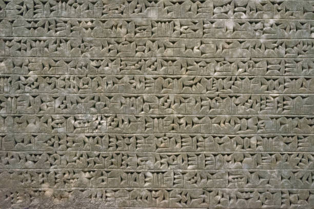 istock Ancient cuneiform from Babylon in Mesopotamia. Assyrian and Sumerian writing carved on clay or stone. 1141127930