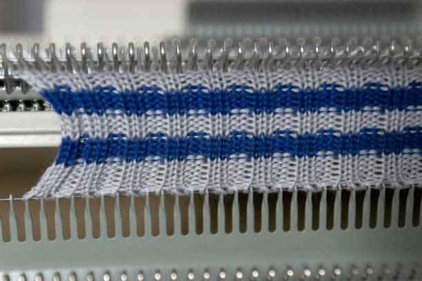 Manual knitting machine. A knitting machine is a device used to create knitted fabrics.