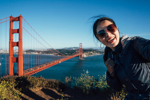 istock Happy young female tourists taking selfie 1141137178