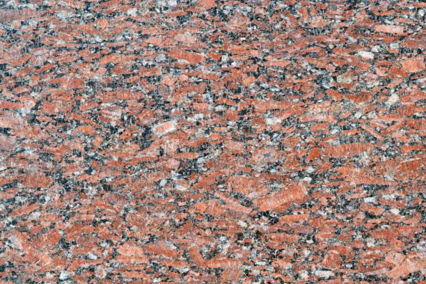 istock The flat surface of a natural marble or brown granite slab. 1141138785