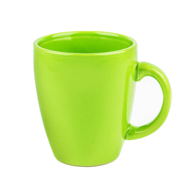 istock Green mug isolated against white background 1141139037
