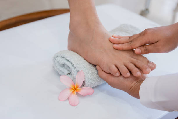 istock Young woman is getting a pedicure feet 1141142163