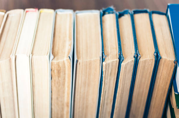 istock Stack of old book education concept background, many books piles with copy space for text 1141142499