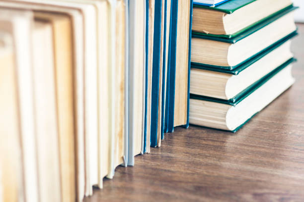 istock Stack of old book education concept background, many books piles with copy space for text 1141142515