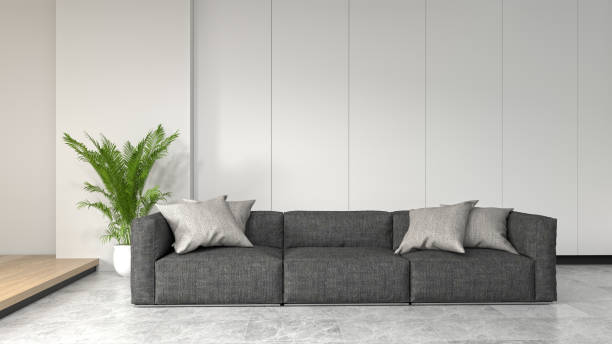 istock Clean room with sofa in front of simple clean white wall with decorative items empty room,open door,3d rendering luxury living room modern mid century room interior home design horizontal ima 1141143688
