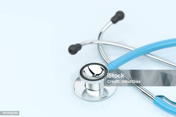 Stethoscope On Blue Background Healthcare Stock Photo - Download Image Now - Doctor, Stethoscope, No People
