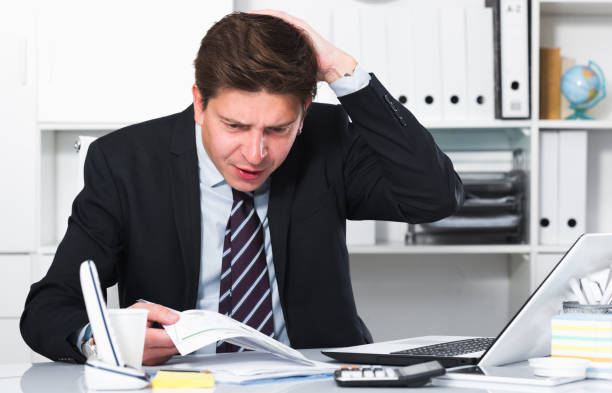 istock Male having lot of work and problems 1141150178