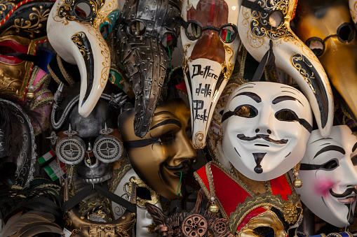Venice Italy - April 06 2019: Venetian masks on sale on a market stall.
