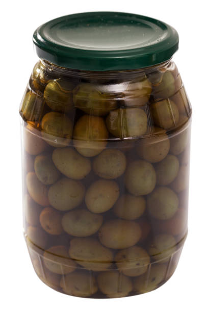 istock Glass jar with whole olives 1141152077