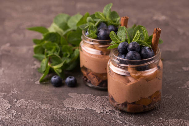 istock Cake dessert. Chocolate mousse with blueberry, mint and cinnamon 1141152543