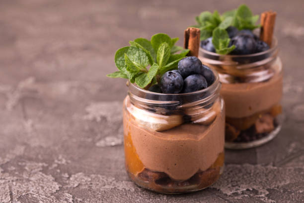 istock Cake dessert. Chocolate mousse with blueberry, mint and cinnamon 1141152577