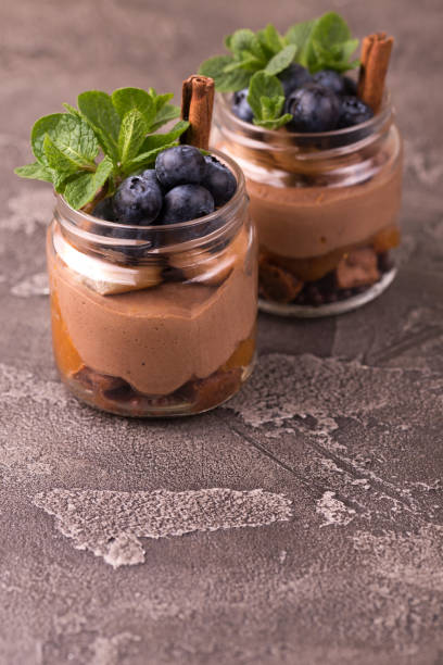 istock Cake dessert. Chocolate mousse with blueberry, mint and cinnamon 1141152765