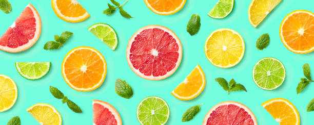 istock Colorful pattern of citrus fruit slices and mint leaves 1141156490