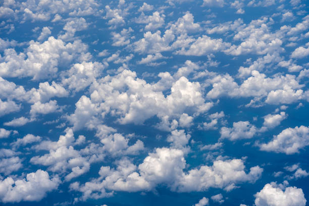 istock White clouds and blue sky, a view from airplane window 1141157776