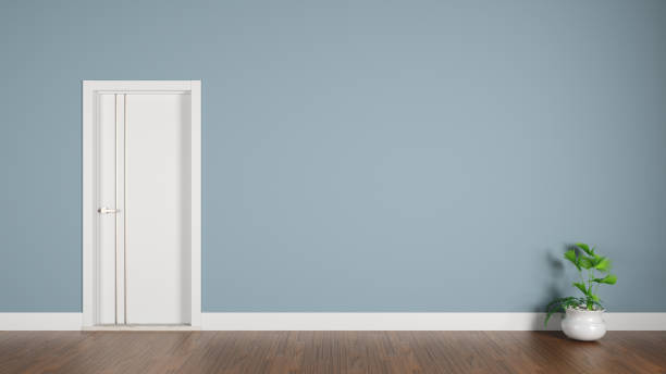 istock Indoors blue wall and white door 1141157831