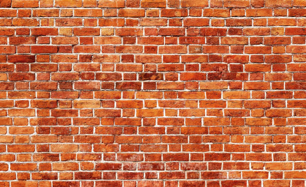 istock Vintage red brick wall as background texture 1141157863