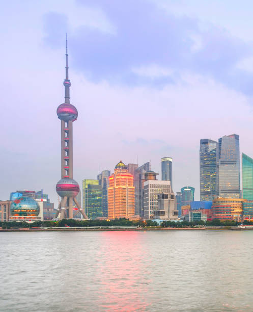 istock Illuminated Shanghai skyline at twilight 1141160150