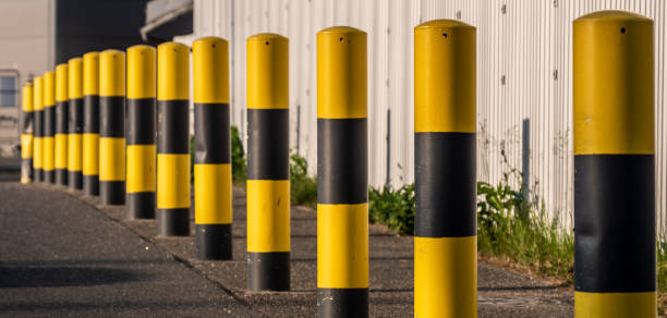 istock Close-Up Of Yellow Bollards 1141162699