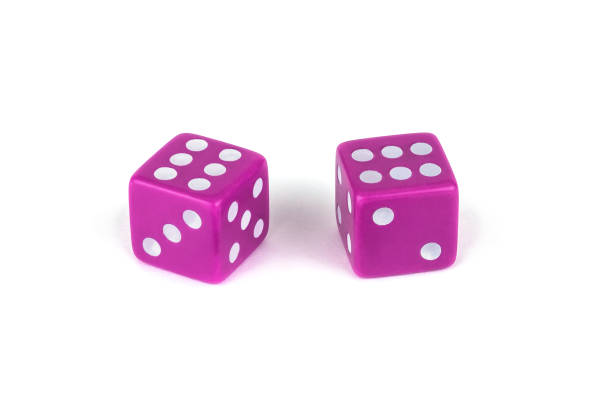 istock Two plastic pink dice isolated on white background. Six and six with a shadow. 1141164392