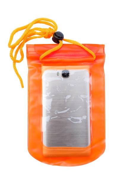 Orange waterproof mobile phone case isolated on white background. PVC ziplock bag protect mobile phone, money and important items from water. Concept for Songkran festival or Water festival in Thailand. Clipping path.