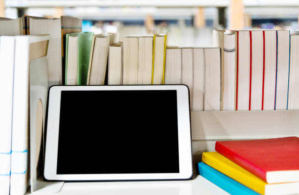 istock Blank digital tablet on the bookshelf 1141167265