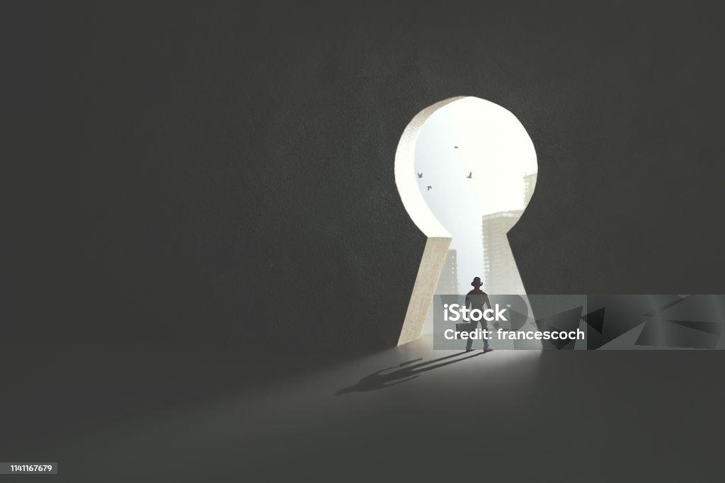 man passing under keyhole shape door Business man ready to get success, surreal concept Key Stock Photo